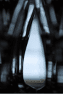 A blurry image of an object in the middle of a room.